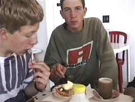 Ryan and James enjoy their tasty food in The Corner House cafe, Watchet, 7.9 miles into the ride